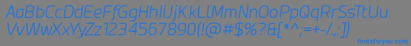 Esphimere Light Italic-Schriftart – Blaue Schriften auf grauem Hintergrund