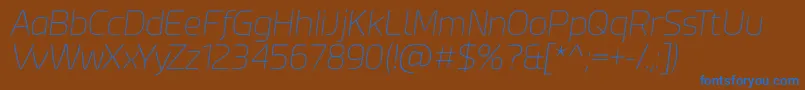 Шрифт Esphimere Thin Italic – синие шрифты на коричневом фоне