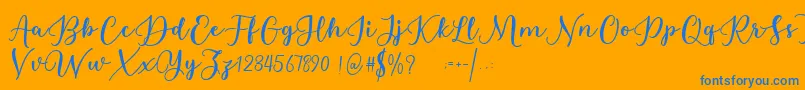 Estafet Letter Script-Schriftart – Blaue Schriften auf orangefarbenem Hintergrund