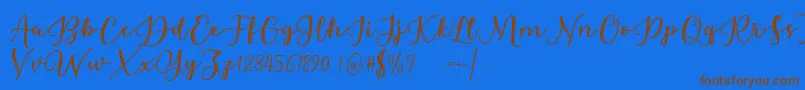 Estafet Letter Script Font – Brown Fonts on Blue Background