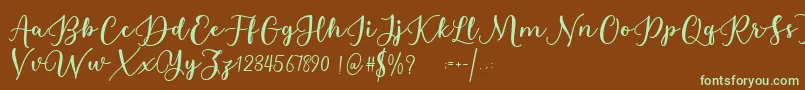Estafet Letter Script Font – Green Fonts on Brown Background