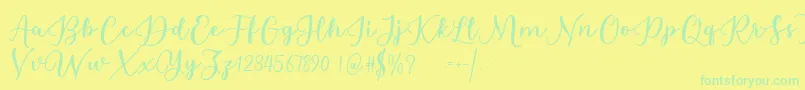 Estafet Letter Script Font – Green Fonts on Yellow Background