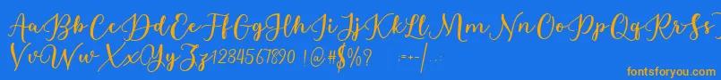 Estafet Letter Script Font – Orange Fonts on Blue Background