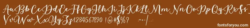 Estafet Letter Script-Schriftart – Weiße Schriften auf braunem Hintergrund