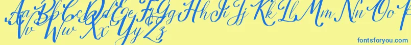 Estella Font – Blue Fonts on Yellow Background