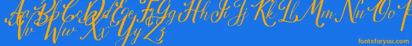 Estella Font – Orange Fonts on Blue Background