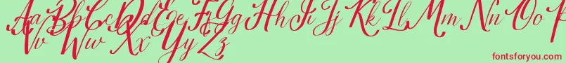 Estella Font – Red Fonts on Green Background