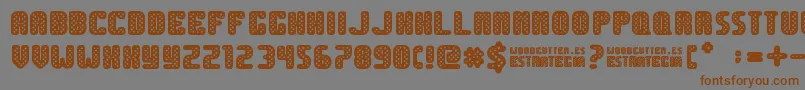 Estrategia Font – Brown Fonts on Gray Background