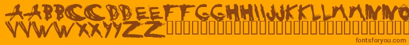 ESTUH   -fontti – ruskeat fontit oranssilla taustalla