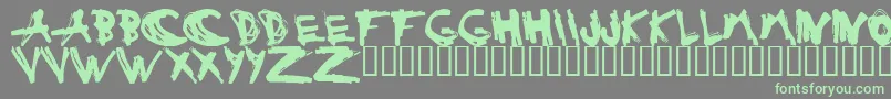 ESTUH   -fontti – vihreät fontit harmaalla taustalla