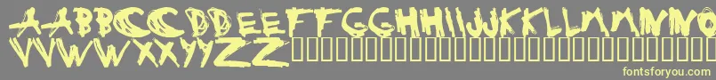 ESTUH   -fontti – keltaiset fontit harmaalla taustalla