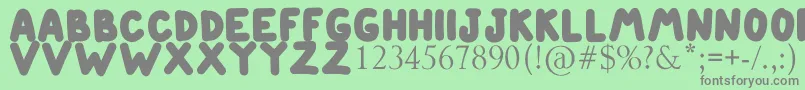 ETIENNE Font – Gray Fonts on Green Background