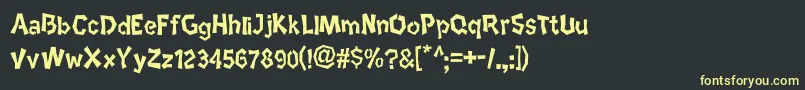 フォントEtnico – 黒い背景に黄色の文字