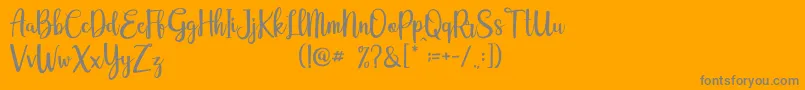 Eurotrophya Dafont-Schriftart – Graue Schriften auf orangefarbenem Hintergrund