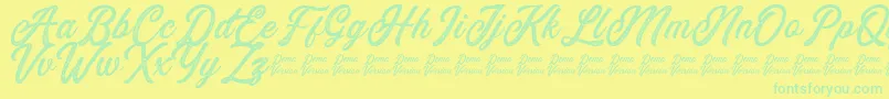 Eusthalia Stamped Font – Green Fonts on Yellow Background