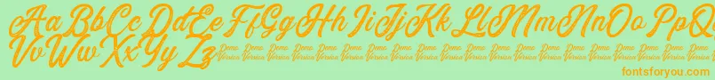 Eusthalia Stamped Font – Orange Fonts on Green Background