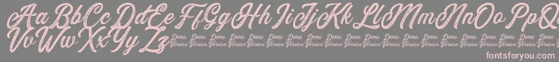 Eusthalia Stamped Font – Pink Fonts on Gray Background