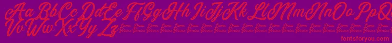 Eusthalia Stamped Font – Red Fonts on Purple Background