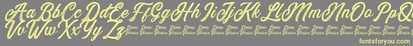 Eusthalia Stamped Font – Yellow Fonts on Gray Background