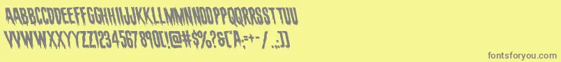 evafangorialeft-Schriftart – Graue Schriften auf gelbem Hintergrund