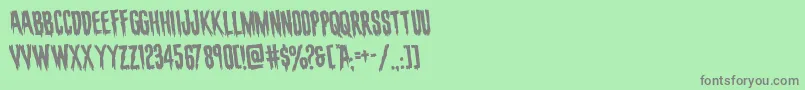 フォントevafangoriarotate – 緑の背景に灰色の文字