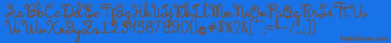 Evangetta Bold Font – Brown Fonts on Blue Background