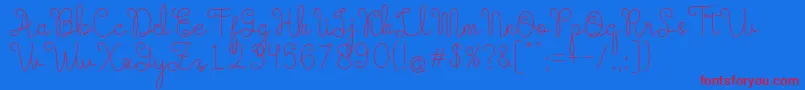 Evangetta Etra Light-Schriftart – Rote Schriften auf blauem Hintergrund