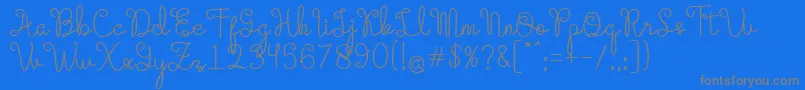 Evangetta Regular Font – Gray Fonts on Blue Background