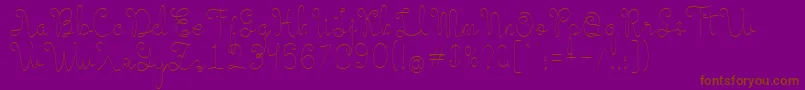 Evangetta Thin-Schriftart – Braune Schriften auf violettem Hintergrund