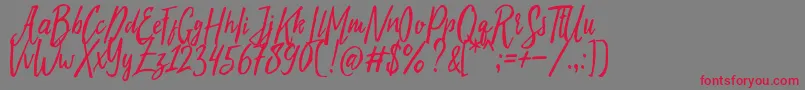 Evelyne Typeface Free Demo-fontti – punaiset fontit harmaalla taustalla