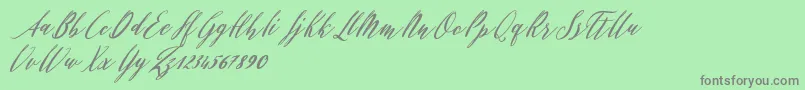 Evelyne Font – Gray Fonts on Green Background