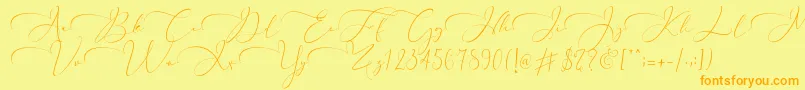 Czcionka Everything Calligraphy   – pomarańczowe czcionki na żółtym tle