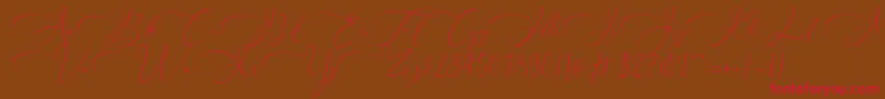 Everything Calligraphy  -Schriftart – Rote Schriften auf braunem Hintergrund