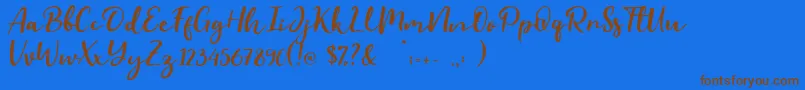 フォントEvident – 茶色の文字が青い背景にあります。