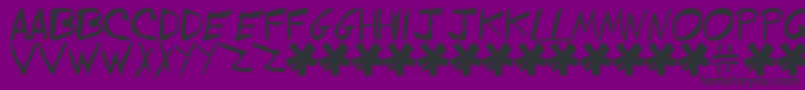 EVOL    -fontti – mustat fontit violetilla taustalla