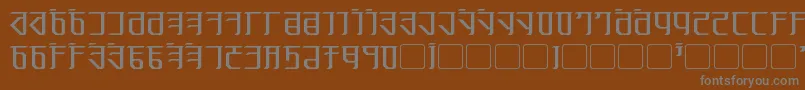 フォントExodite – 茶色の背景に灰色の文字