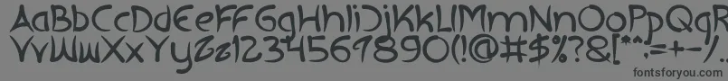 フォントEXTRA HOT Bold – 黒い文字の灰色の背景