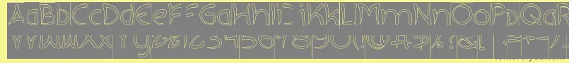 EXTRA HOT Hollow Inverse-fontti – harmaat kirjasimet keltaisella taustalla