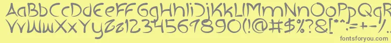 フォントEXTRA HOT – 黄色の背景に灰色の文字