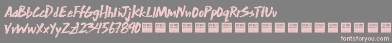 フォントExtra Mile   Demo – 灰色の背景にピンクのフォント