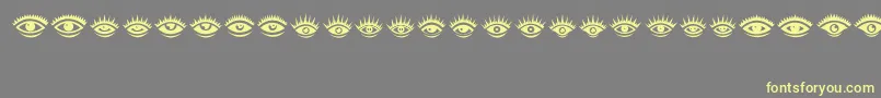 Eyez Font – Yellow Fonts on Gray Background