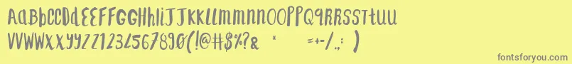 フォントF    SAINT TROPEZ ALT2 – 黄色の背景に灰色の文字