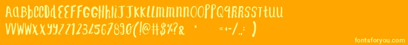 F    SAINT TROPEZ ALT2 Font – Yellow Fonts on Orange Background