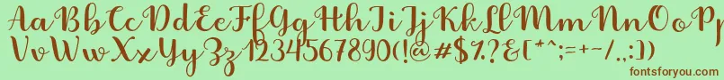 Fabitha Script Font – Brown Fonts on Green Background