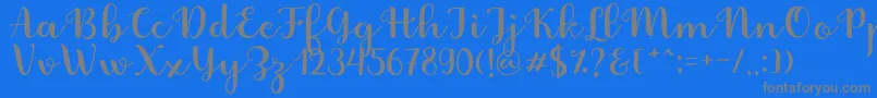 Fonte Fabitha Script – fontes cinzas em um fundo azul