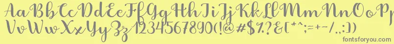 Fabitha Script Font – Gray Fonts on Yellow Background