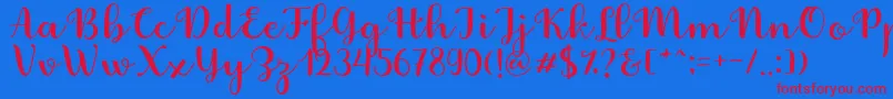 Fabitha Script Font – Red Fonts on Blue Background
