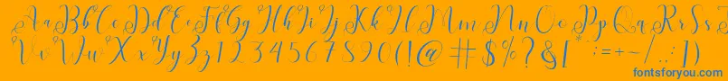 fabitha-Schriftart – Blaue Schriften auf orangefarbenem Hintergrund