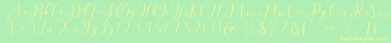 fabitha Font – Yellow Fonts on Green Background