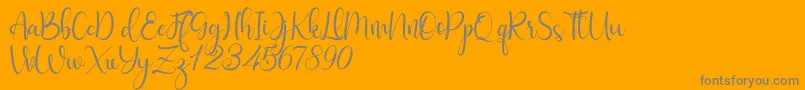 Fabulous-Schriftart – Graue Schriften auf orangefarbenem Hintergrund